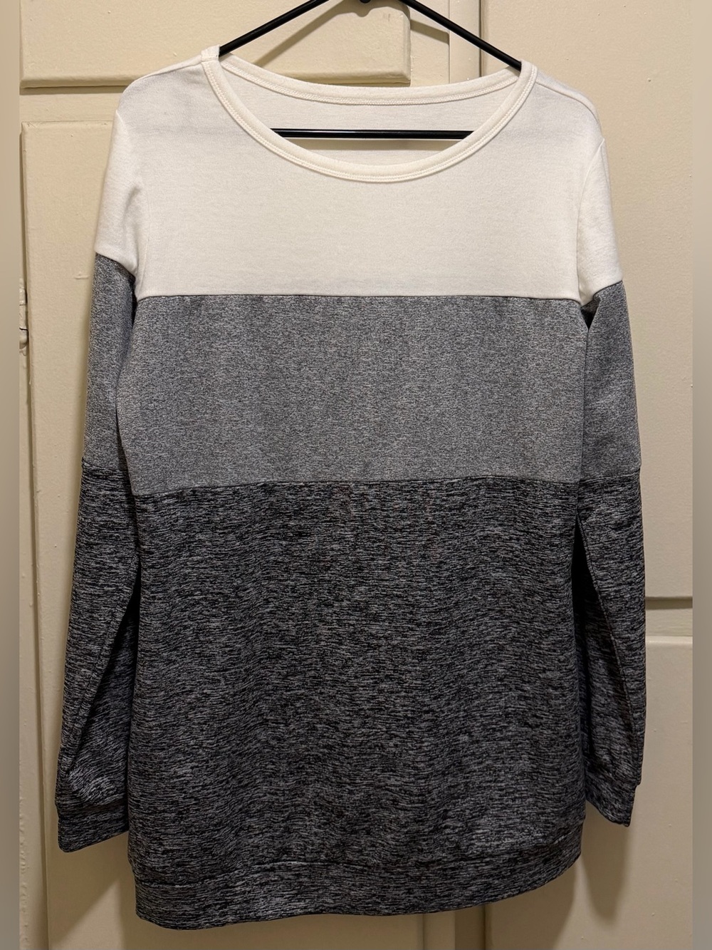 Large long sleeve scoop neck tee.